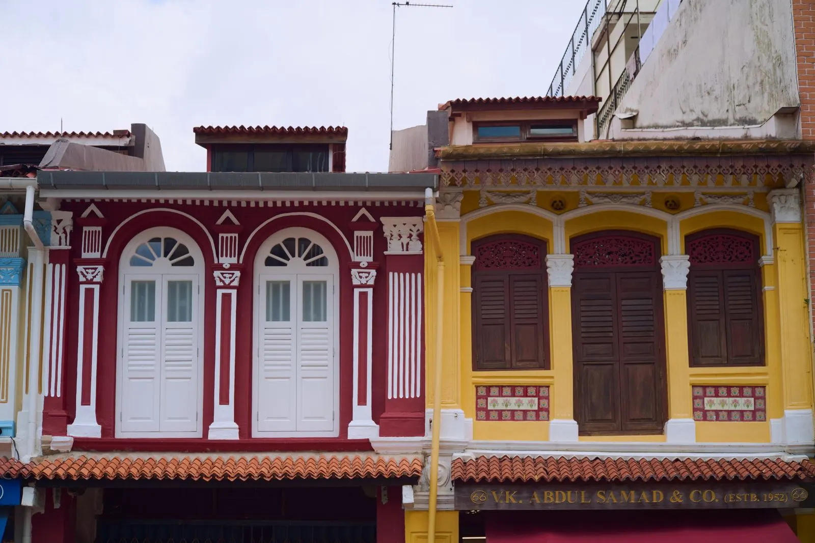 Colorful heritage shophouses along a Singapore street in a historical district